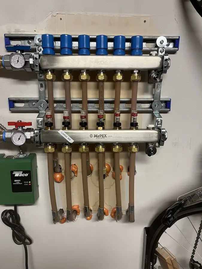 Plumber performing Gas Line Installation at a residential property in Center